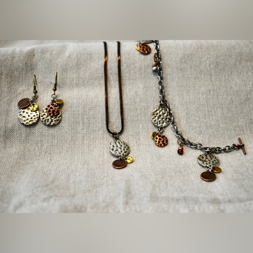Handmade silver, gold and bronze necklace, bracelet and earring set.